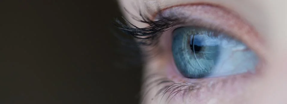 Dramatic close up of human eye in motion Cinemagraph 스톡 사진