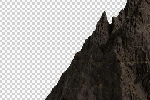 A dramatic close-up of a jagged, dark mountain peak 库存照片