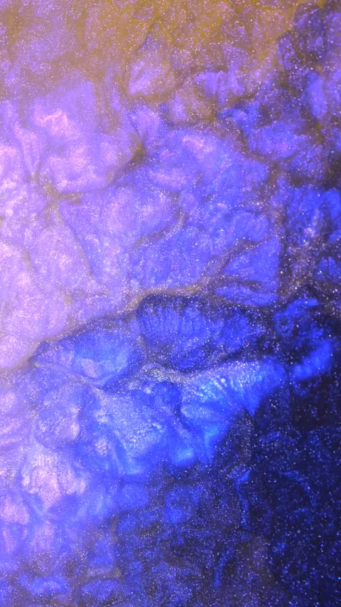 Dramatic close-up of shimmering blue and purple textures created by light Stock Footage 288245817