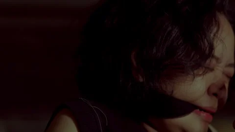 Dramatic Close-Up of a Woman in Distress Stock Footage 294196000