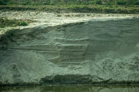 A dramatic closeup of an eroded riverbank reveals beautiful Stock Photos