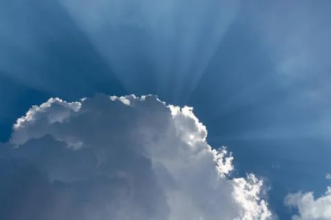 Dramatic cloud on the background of sun rays Stock Photos
