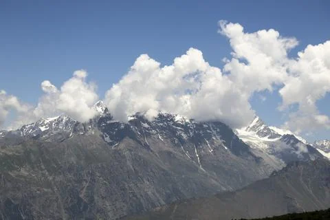 Dramatic Cloud Covered Glacier Mountains in Kalam Stock Photos
