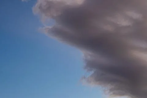 Dramatic Cloud Formation in Blue Sky Фото