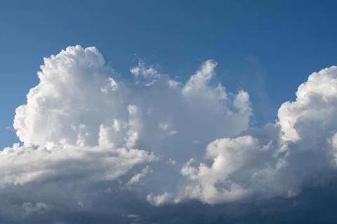 Dramatic cloud formation fast rising cumulus clouds filling the format Stock Photos