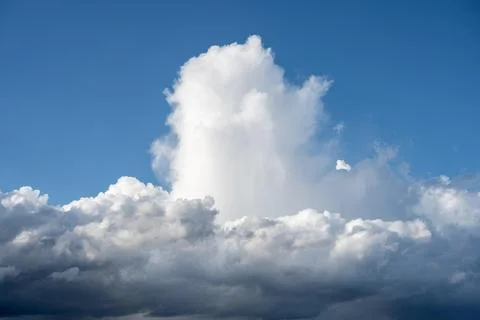 Dramatic cloud formation fast rising cumulus clouds filling the format Stock Photos