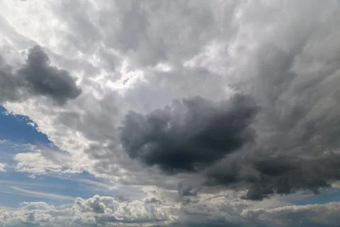 The Dramatic Cloud Formation Over a Beautiful Blue Sky Captivates the Viewer and 写真素材