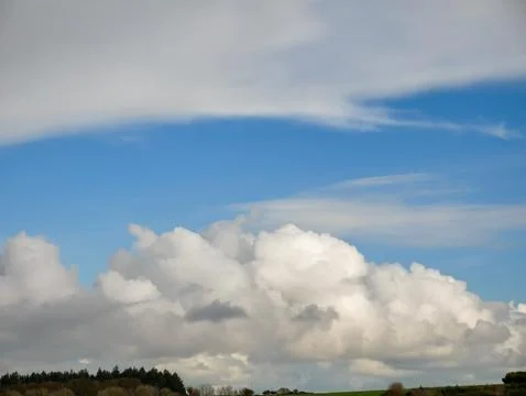 Dramatic Cloud Formation Over Blue Sky Stock Photos