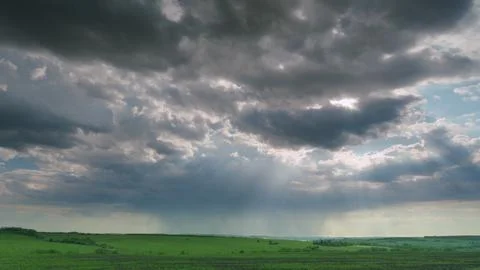 Dramatic Cloud Formation Showcasing a Stunning Vista Over a Lush, Green Landscap Stock Photos