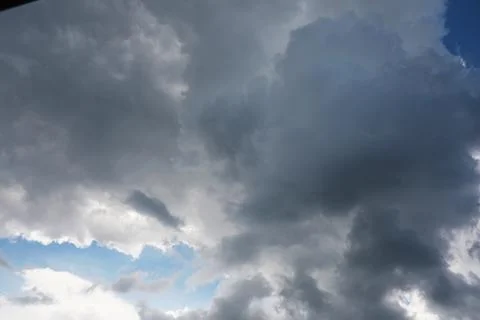 Dramatic Cloud Formation with Sunlight Breaking Through 스톡 사진