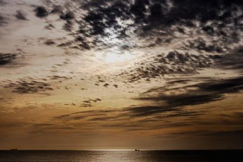 Dramatic cloud formations above calm Atlantic horizon Stock Photos