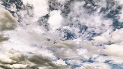 Dramatic Cloud Movement Across a Clear Blue Sky Timelapse Stock Footage 336390966