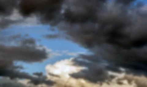 Dramatic cloud panorama on blurred background 写真素材