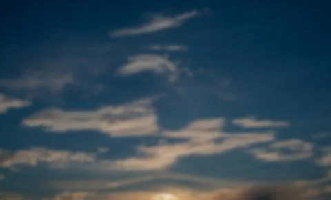 Dramatic cloud panorama on blurred background Stock Photos