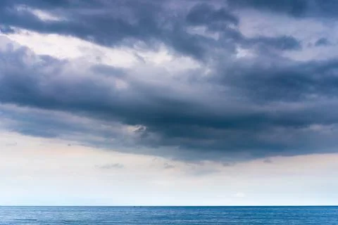 Dramatic cloud sky background Heawy rainy clouds Beautiful cloudscape Blue co Stock Photos