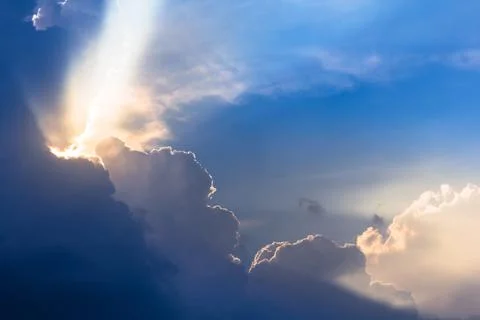 Dramatic cloud sunset time with sunbeams Stock Photos
