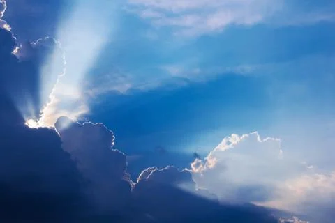 Dramatic cloud sunset time with sunbeams Stock Photos