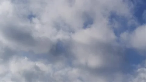 Dramatic cloud timelapse over tropical sky with Stock Footage 334357894