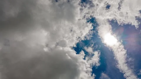 Dramatic Cloud Timelapse Showing Sun Flare and Sky Movement Over Cornwall, UK Stock Footage 338033296