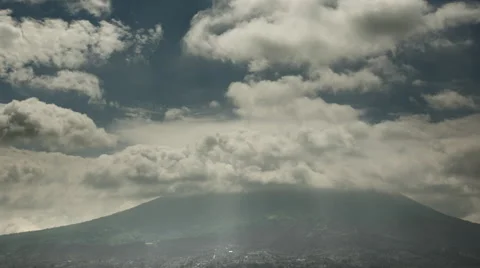Dramatic cloudplay over lower slopes of Mount Merapi, Indonesia Stock Footage 45350851