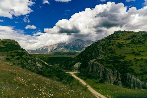 Dramatic Clouds Above Green Mountain Valley Trail Stock Photos