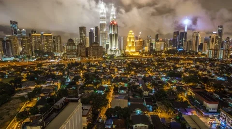 Dramatic Clouds Above Kuala Lumpur Cityscape, Timelapse Pan Up Video stock 56521414