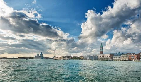 Dramatic clouds above a Venice cityscape Stock Illustration