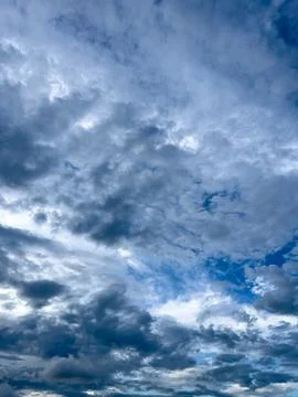 Dramatic Clouds Against Blue Sky Stock Photos