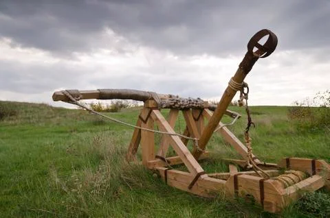 Dramatic clouds and an ancient camp, restored from medieval time Stock Photos