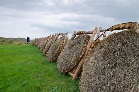 Dramatic clouds and an ancient camp, restored from medieval time Stock Photos