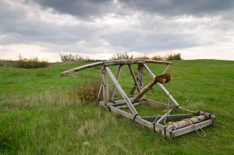 Dramatic clouds and an ancient camp, restored from medieval time Stock Photos