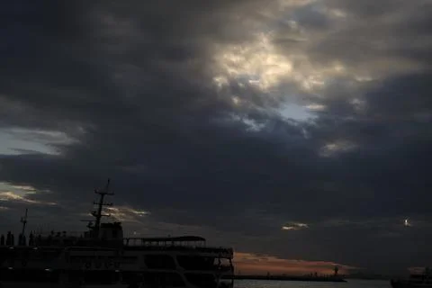 Dramatic clouds and a beautiful sunset Stock Photos