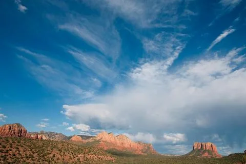 Dramatic clouds and courthouse butte Stock Photos
