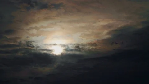 Dramatic clouds and a plane in the distance Stock Footage 107071208