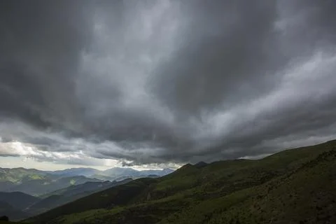 Dramatic clouds and storm in La Cerdanya, Pyrenees, Girona, Catalonia, Spain Stockfoto's
