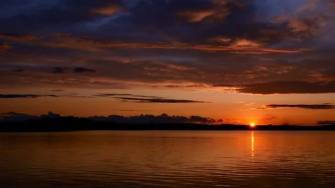 Dramatic clouds and sunset ove beautifulr Lake Irving in Bemidji Minnesota. Stock Footage 115717217