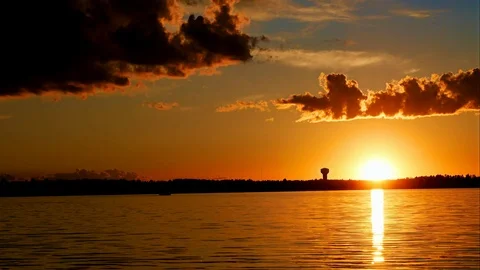 Dramatic clouds and sunset over Lake Irving in Bemidji Minnesota, time-lapse. Stock Footage 91014056