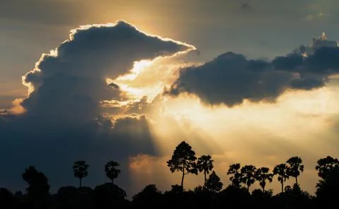 Dramatic clouds and sunset sky. Stock Photos