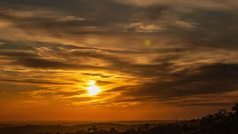Dramatic clouds and Yellow Sunset over California Stock Footage 278268235