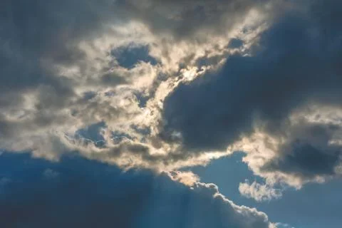 Dramatic clouds on blue sky background Stock Photos