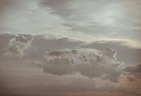 Dramatic clouds with blue sky background before sunset. Stock Photos