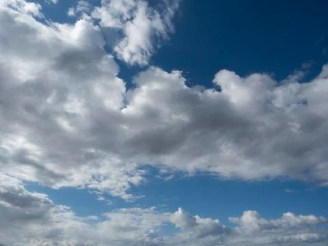 Dramatic clouds in the blue sky 写真素材