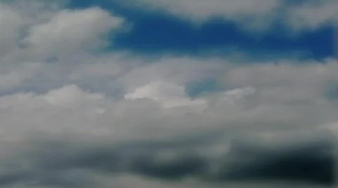 Dramatic clouds in blue sky Timelapse Video stock 704815