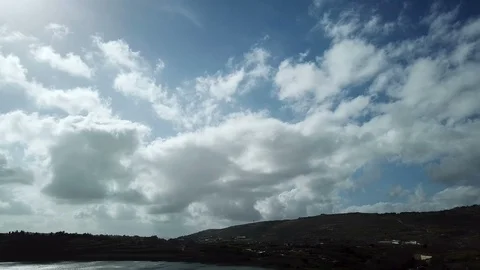 Dramatic Clouds on bright sky and dark mountains over lake Stock Footage 88149617