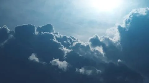 Dramatic clouds in cold sunlight in stormy weather Dramatic clouds in cold... Stock Photos