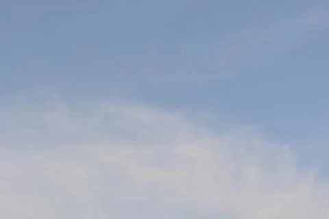 Dramatic clouds in the eastern sky with the sun rises behind it Stock Photos