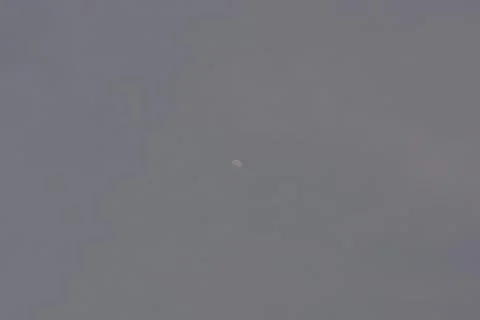 Dramatic clouds in the eastern sky with the sun rises behind it Stock Photos