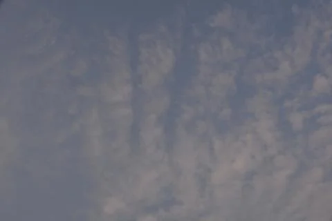 Dramatic clouds in the eastern sky with the sun rises behind it Stock Photos