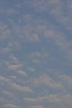 Dramatic clouds in the eastern sky with the sun rises behind it Stock Photos