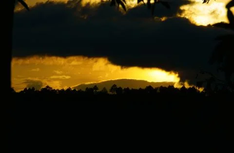 Dramatic clouds on evening sky Stock Photos